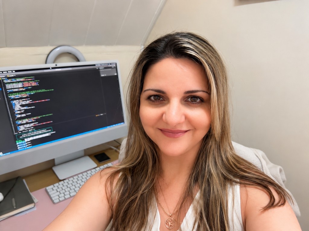 Cheryl Regan, SEO freelancer in Swansea, at her desk